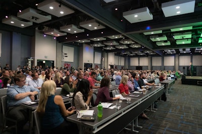 People gather at Procede's user conference in 2023.