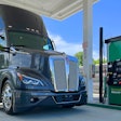 Kenworth truck with natural gas engine at fuel pump
