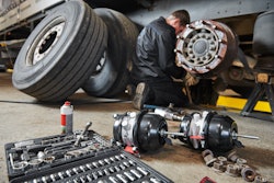 Technician working on a wheelend