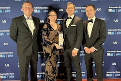 Eaton's team accepts an award for the company's four-speed, heavy duty EV transmission.
