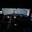 driver inside a truck cab