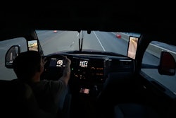 driver inside a truck cab