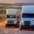 Two used trucks on highway
