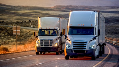 Two used trucks on highway