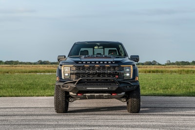 black Hennessey 2024 Ford F-150 Velociraptor front view on road