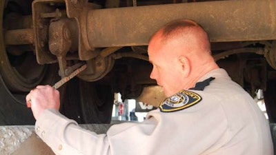 Brake inspection conducted under vehicle