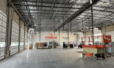 An interior warehouse with service bays