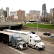 Trucks driving on the highway in city