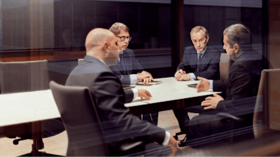 Group of men in a business meeting