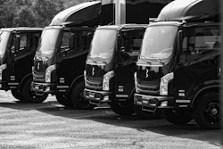 Bollinger Motors trucks parked in a lot