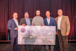 Five men holding a large check at the Ryder Top Technician competition
