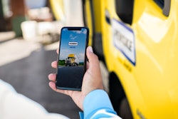 Penske Truck Leasing mobile app in customer's hand