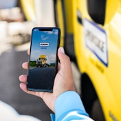 Penske Truck Leasing mobile app in customer's hand