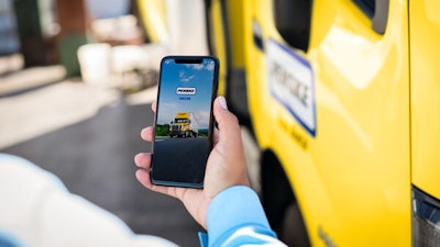 Penske Truck Leasing mobile app in customer's hand