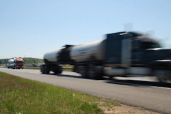 speeding truck blurred driving on the highway