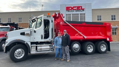 Excel Truck Group salesperson with customer