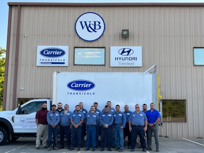 Superior Trailer Sales service team in front of truck