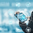 Man holding tablet and evaluating data