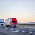 Line of trucks coming into view