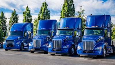 Blue trucks of multiple brands