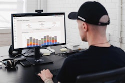 A man looking at a computer screen.