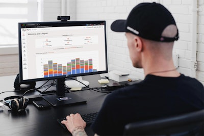 A man looking at a computer screen.