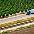 California truck driving by a farm