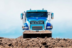 Mack Granite on a dirt field
