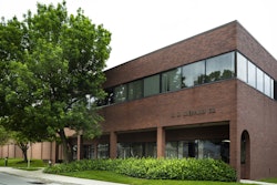 An office building with a sign that says R.H. Sheppard Co.