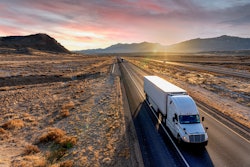 A truck driving through the desert