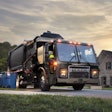 A garbage truck on a residential street