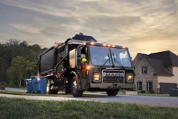 A garbage truck on a residential street