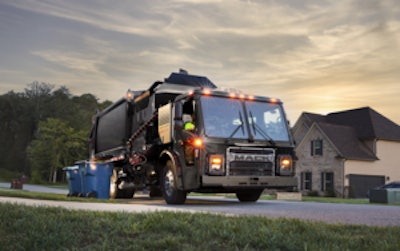 A garbage truck on a residential street