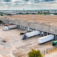 Trucks at a warehouse in an industrial area