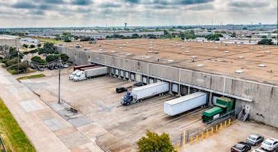 Trucks at a warehouse in an industrial area