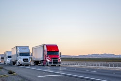 Trucks coming into view from the left
