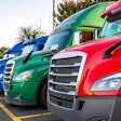 Multi colored row of tractors