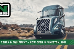 A Volvo truck going down a desert highway with the Nuss logo captioned Nuss Truck & Equipment, now open in Sikeston, Mo.