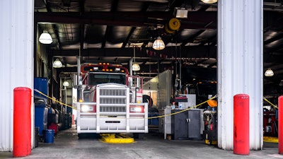 Truck in service bay