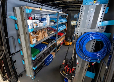 A shelving until in back of a van