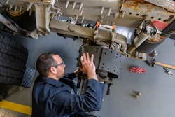 Bendix technician on brake drum