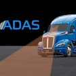 A Kenworth truck with a forward-looking camera that supports ADAS