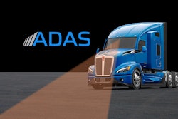 A Kenworth truck with a forward-looking camera that supports ADAS
