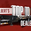 A flatbed trailer with Talbert's Top 10 Dealers logo