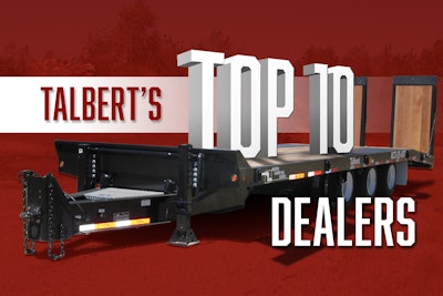 A flatbed trailer with Talbert's Top 10 Dealers logo
