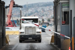 A truck waits at a border crossing