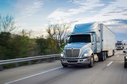 Class 8 truck driving on a highway