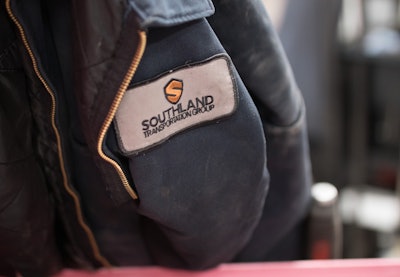 A Southland Transportation Group jacket hangs in a shop