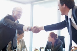 Businessmen Shaking Hands After Deal