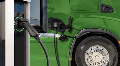 Green Truck Getting Charged